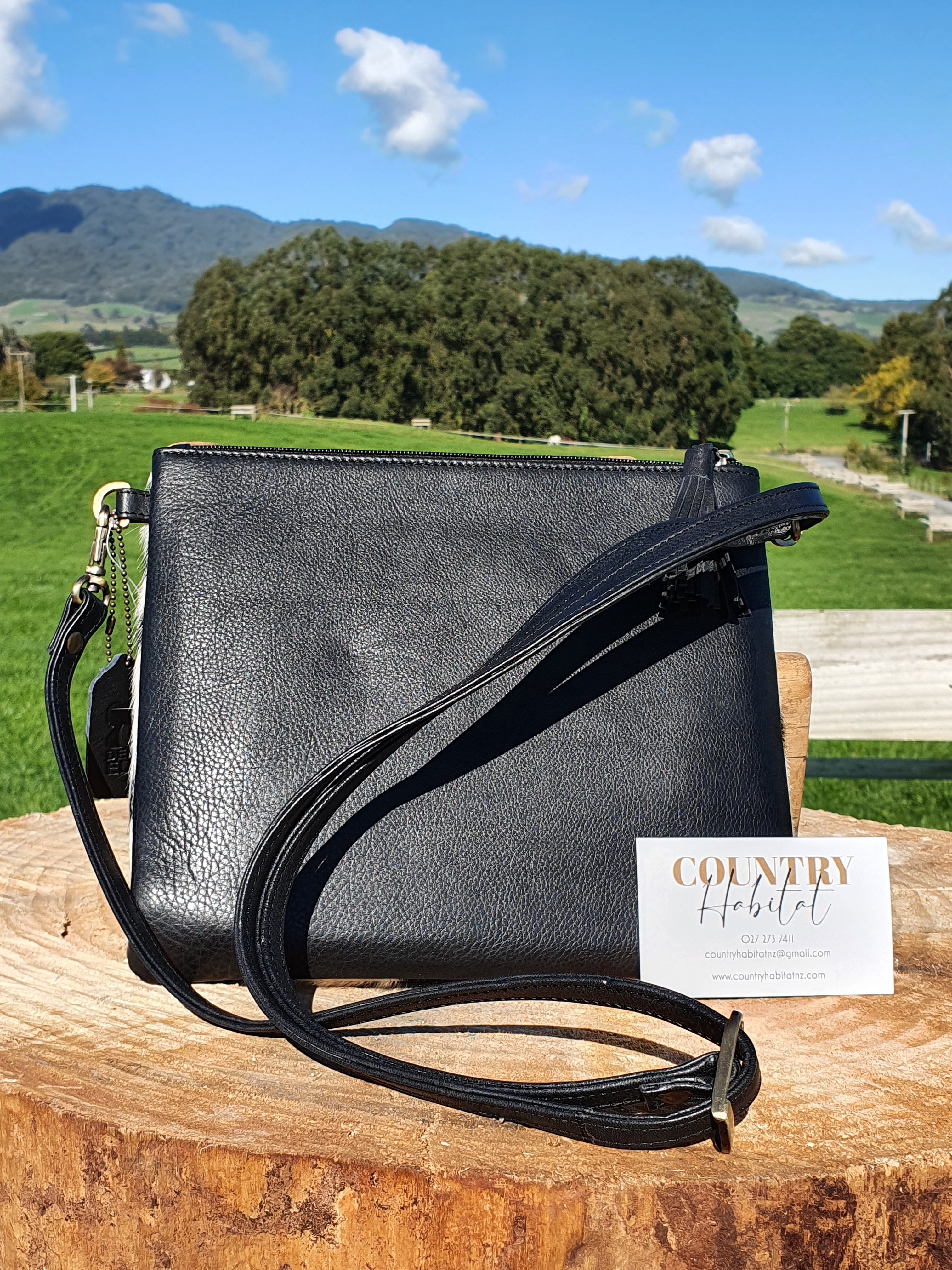 The Torronto - Light Black and White Cowhide Clutch Bag